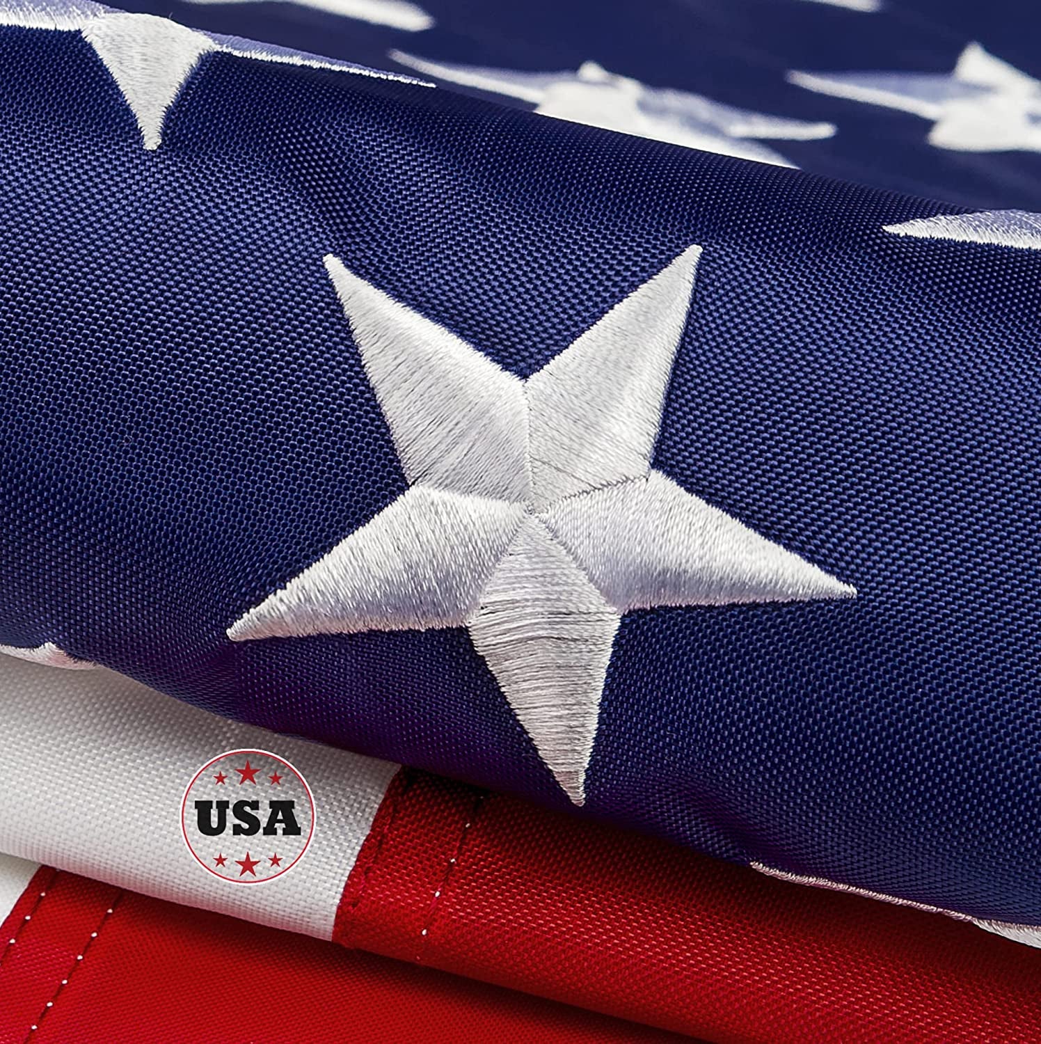 This 8X12 Ft American Flag for Outside, 100% in USA Strongest, Longest Lasting, Heavy Duty 420D Nylon, Embroidered Stars, Sewn Stripes, Brass Grommets Perfect for Outdoors! Premium US Flag